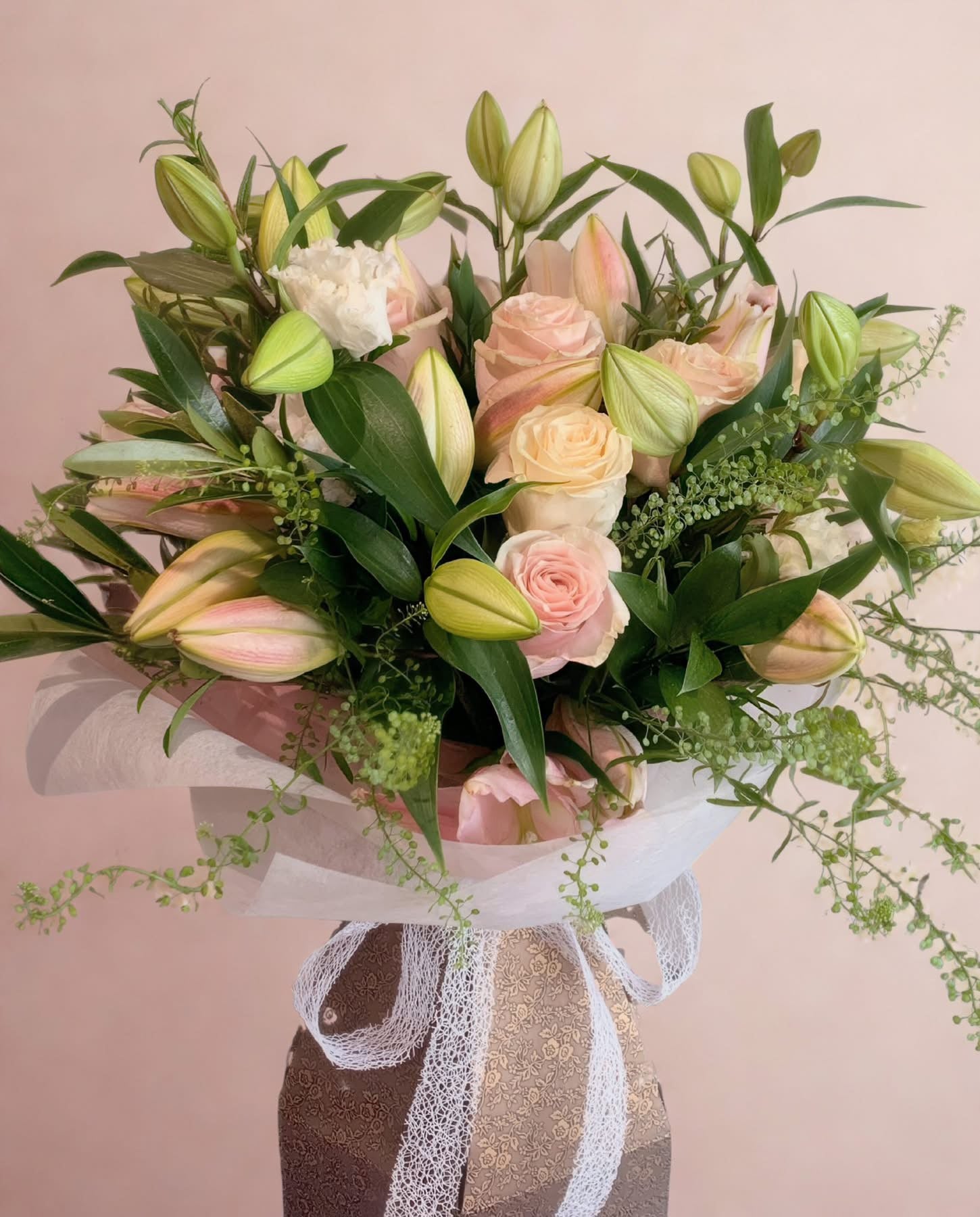Rose and lily bouquet, pink and white